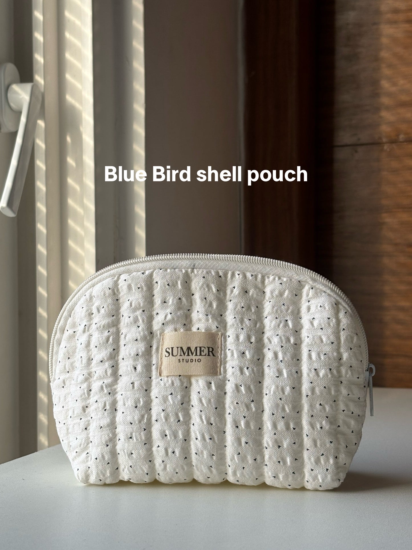 Blue Bird shell pouch